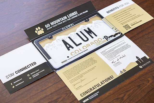UCCS Alumni License Plate Holder and Envelope