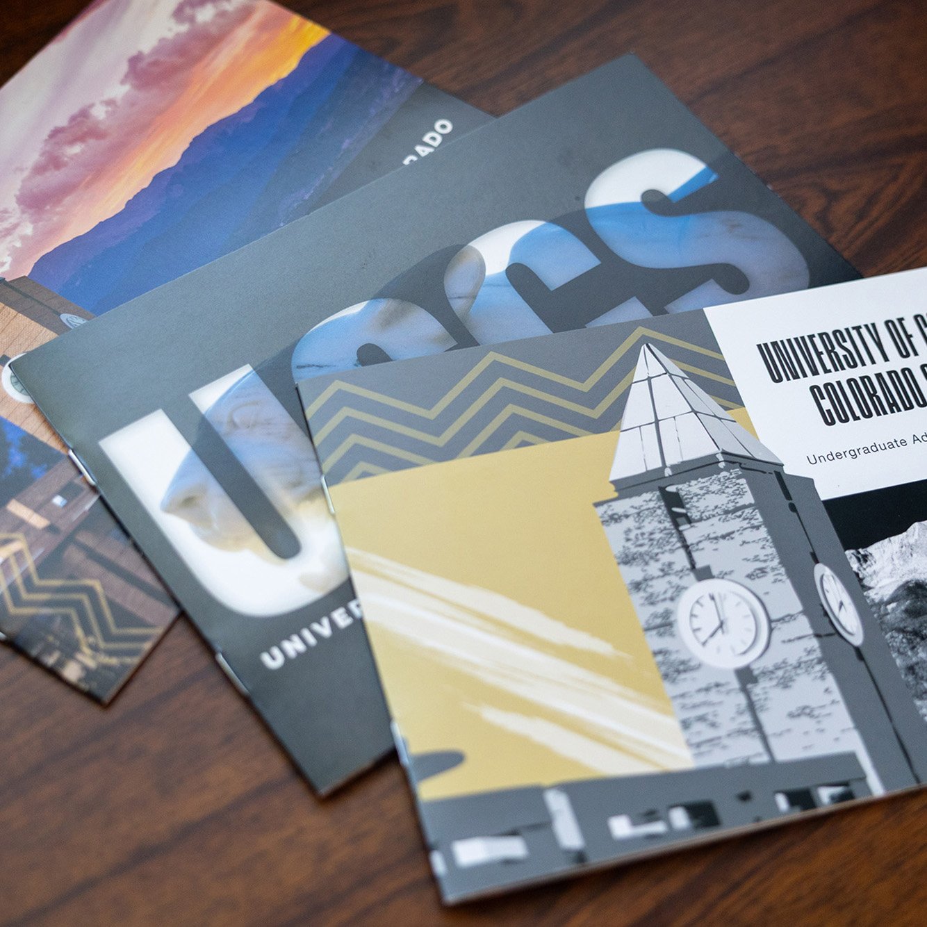 UCCS viewbooks stacked together