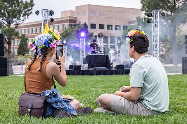 UCCS students taking photo of DJ at Concert on the Lawn
