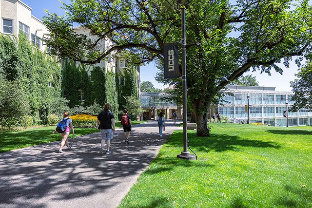 UCCS walking in front of Main Hall