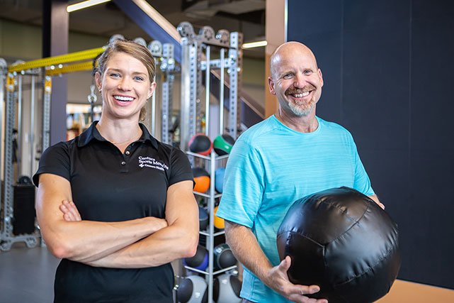 UCCS trainer and trainee at the Hybl Center