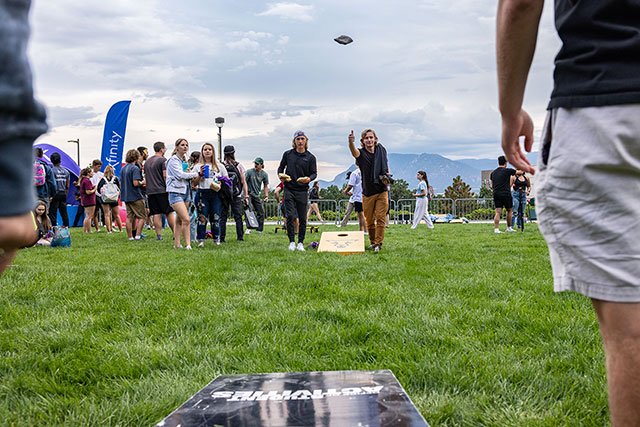 UCCS students playing corn hole