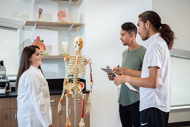 UCCS health faculty member talking to students