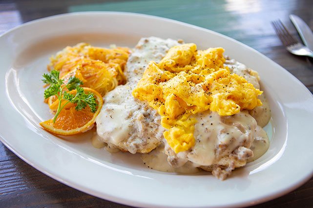 Bourbon Brothers biscuits and gravy topped with eggs