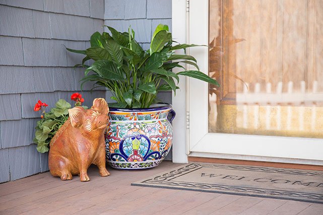 La Fuente Imports planters on porch