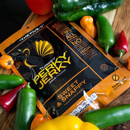 Perky Jerky surrounded by peppers
